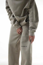 Person wearing a celadon Gravity Joggers