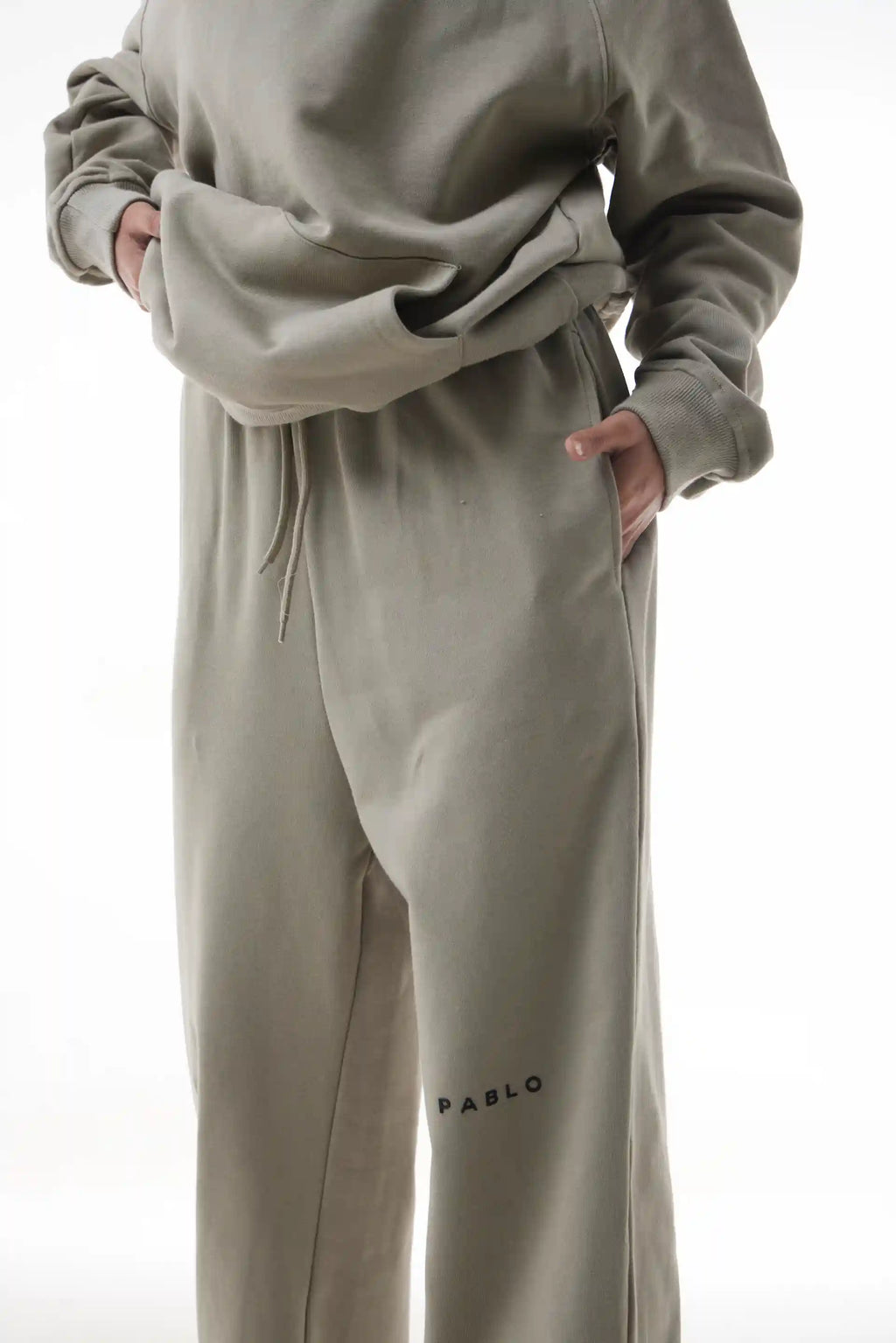 Person wearing a celadon Gravity Joggers