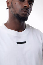 Man wearing a white Prime Men's Cut