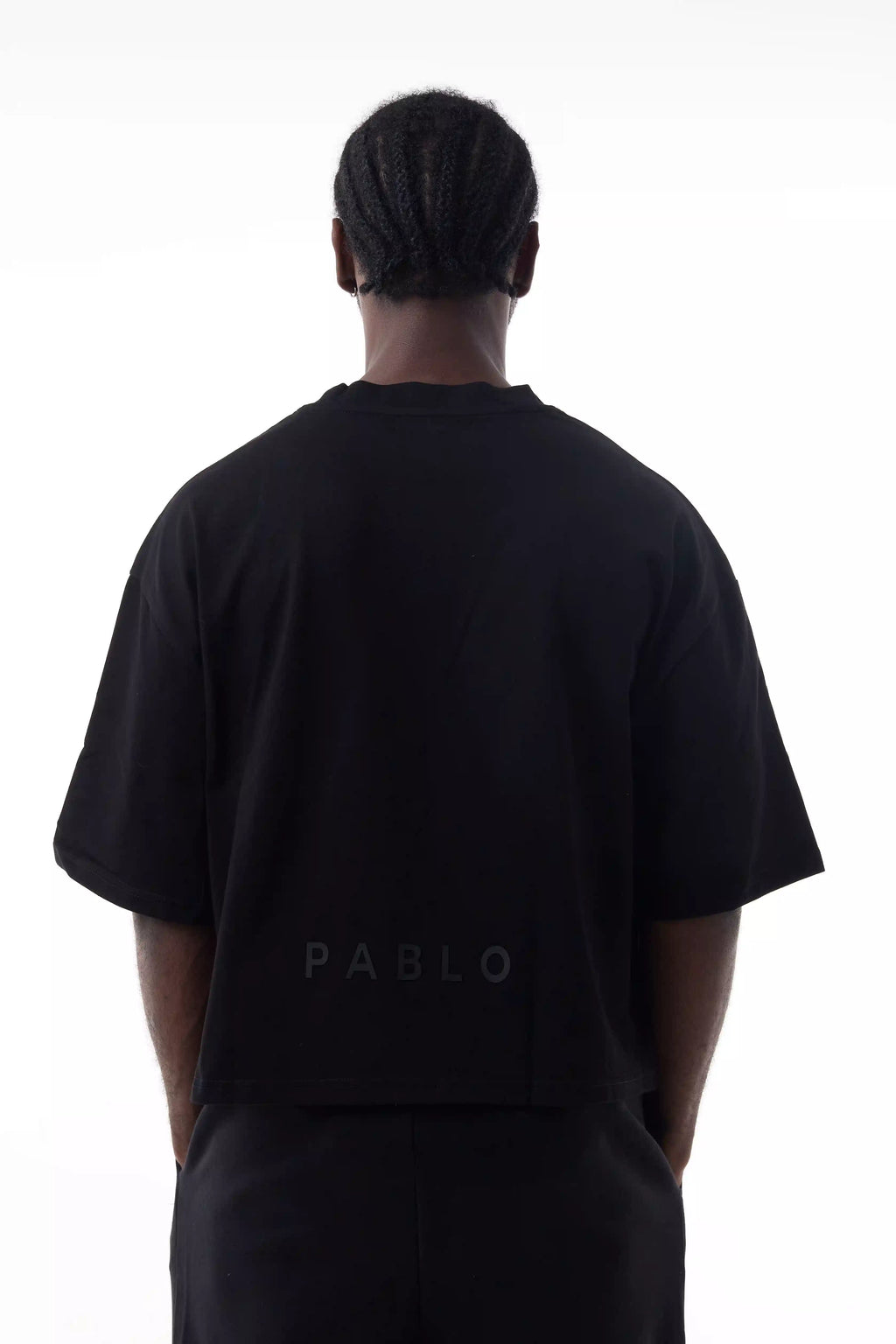 Man wearing a black Prime Men's Cut