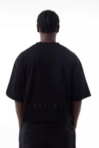 Man wearing a black Prime Men's Cut