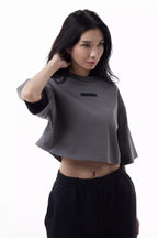 Woman wearing a gray Prime Women's Cut