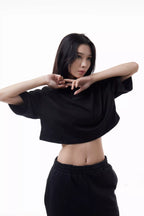 Woman wearing a black Prime Women's Cut