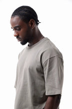 Man wearing a beige Vibe Drift Tee
