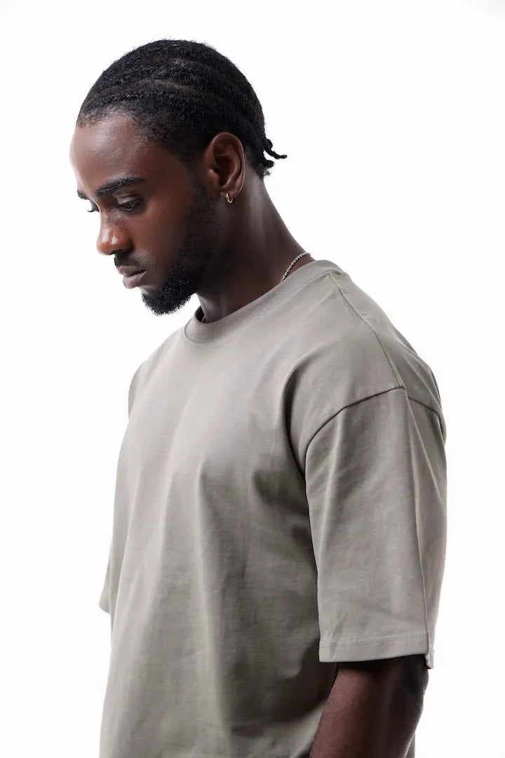 Man wearing a beige Vibe Drift Tee